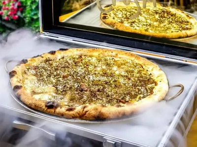 Pizza com ouro 24k e trufa negra custa até R$ 350 em Balneário Camboriú