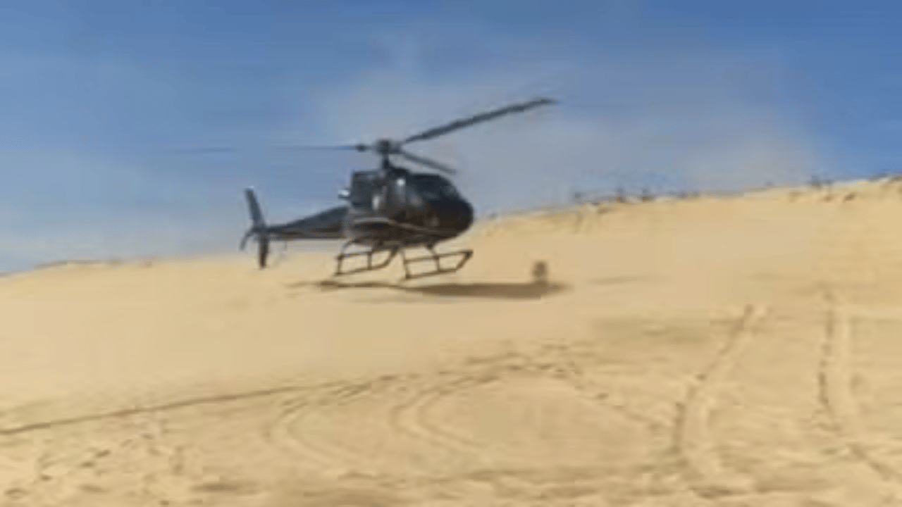 Empresário pousa helicóptero para comprar peixe frito na praia