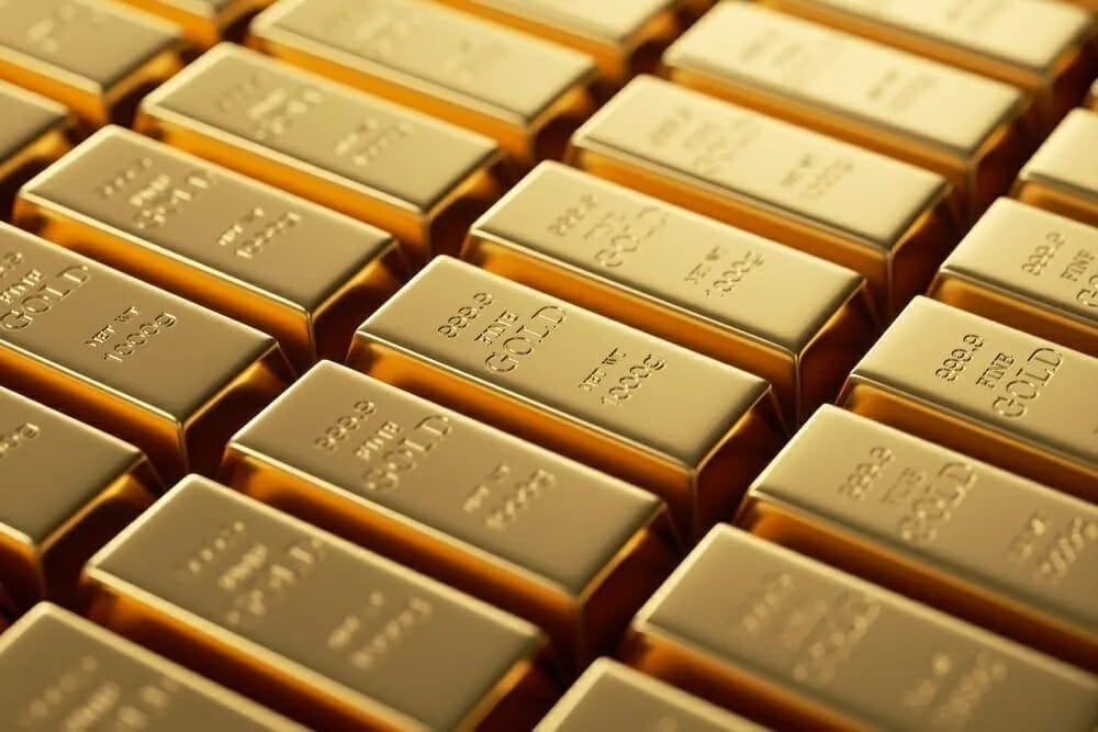 Ouro dispara com tarifas e tensão no Oriente Médio; CME sofre falha técnica