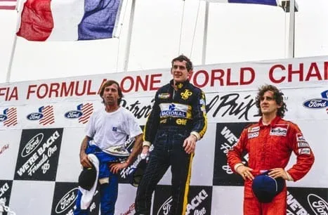 Jacques Laffite, Ayrton Senna e Alain Prost no pódio em Detroit de 1986