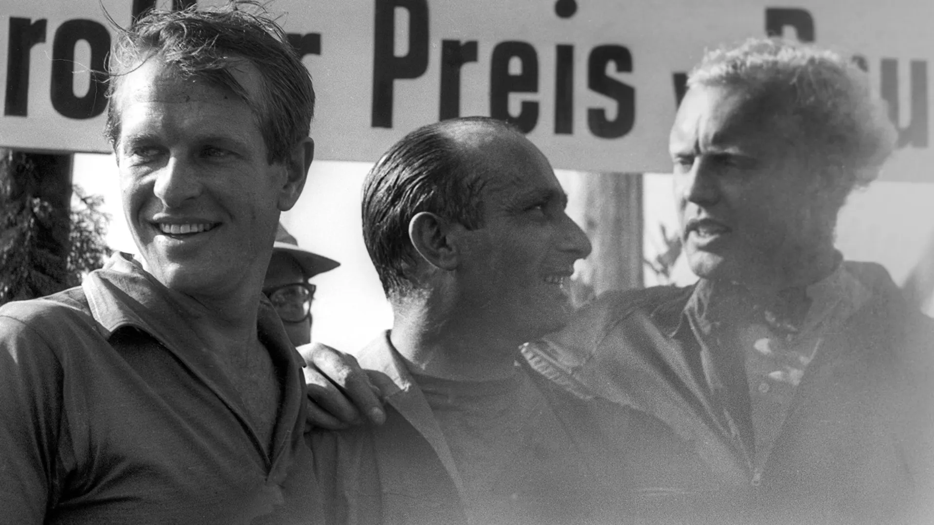 Peter Collins, Juan Manuel Fangio e Mike Hawthorn no pódio do Grande Prêmio da Alemanha em 1957