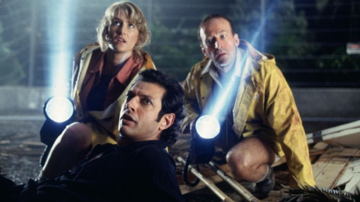 Bob Peck (de amarelo) com Laura Dern e Jeff Goldblum (Créditos: Universal Pictures)