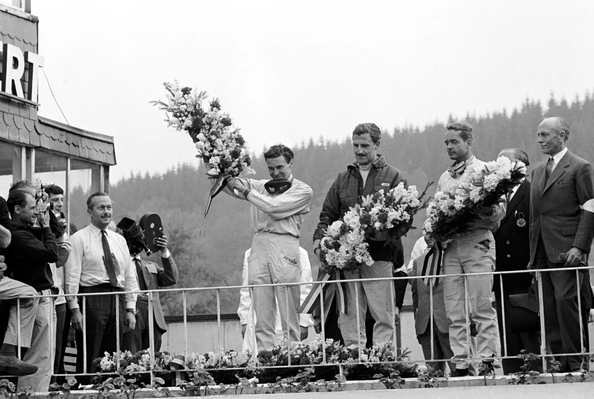 im Clark, Graham Hill e Phil Hill no pódio do GP da Bélgica de 1962 - Crédito: X