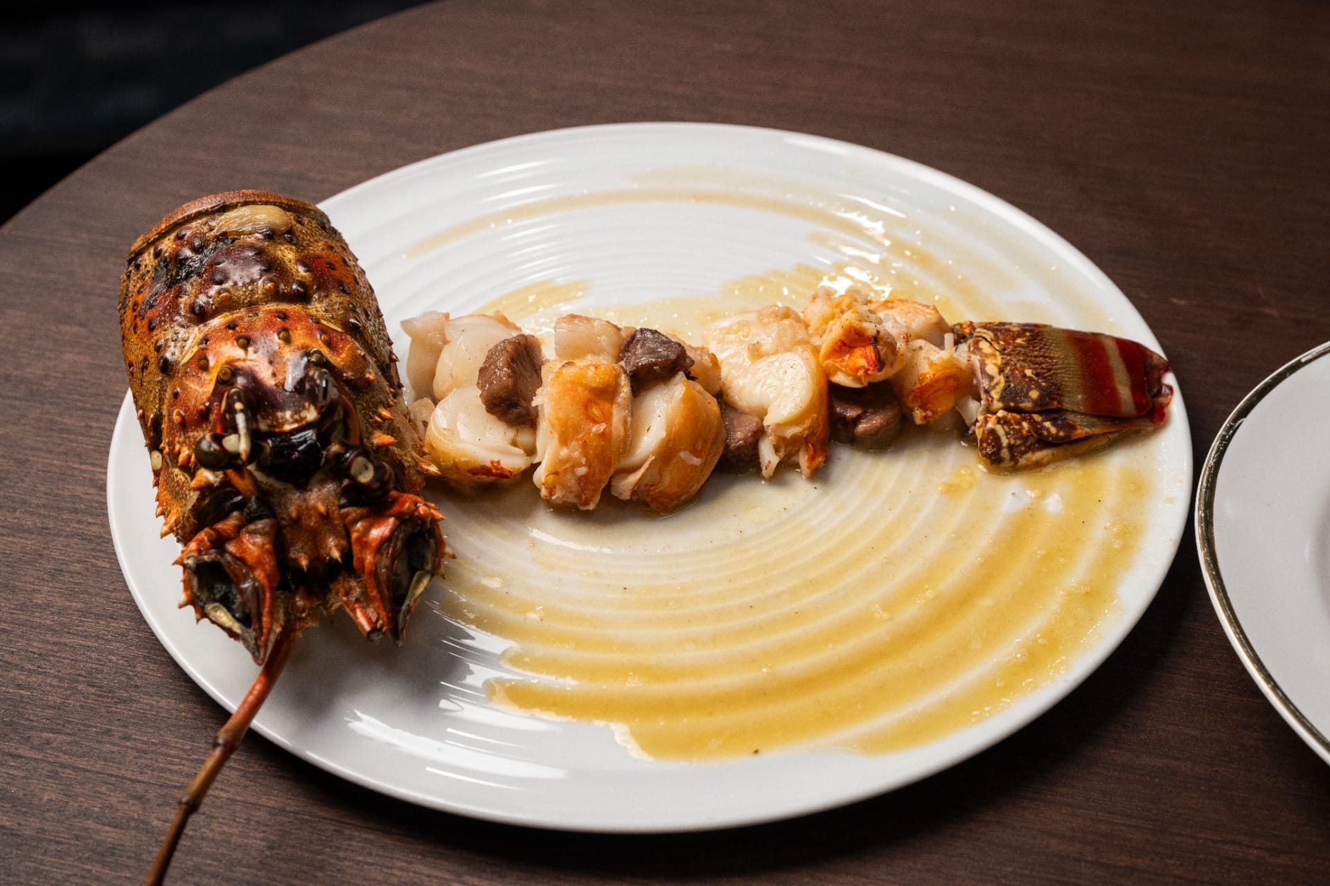 Lagosta com tutano e mini alcachofras no azeite de ervas e molho de espumante | Band Receitas